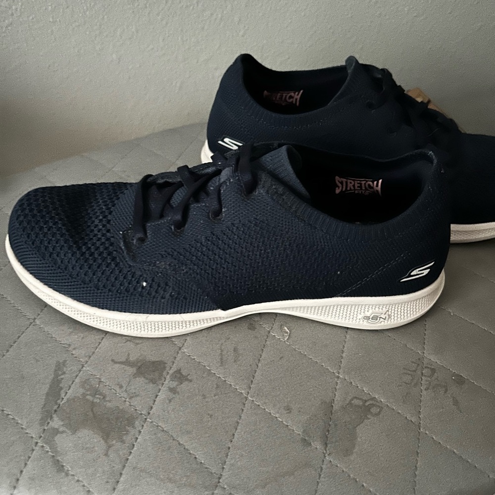 Sketchers navy blue slip on sneakers